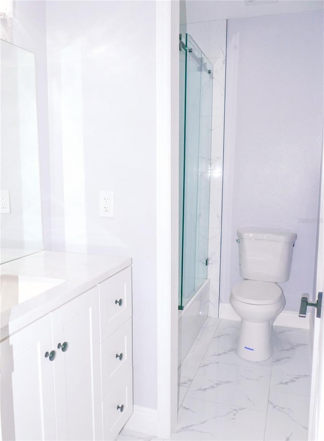 1302 Highview Rd, Brandon, FL 33510 - full bathroom featuring vanity, shower / bath combination with glass door, and marble look tiles