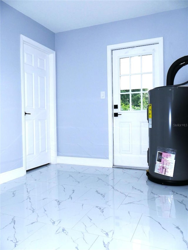 1302 Highview Rd, Brandon, FL 33510 - entrance foyer featuring electric water heater and marble finish flooring