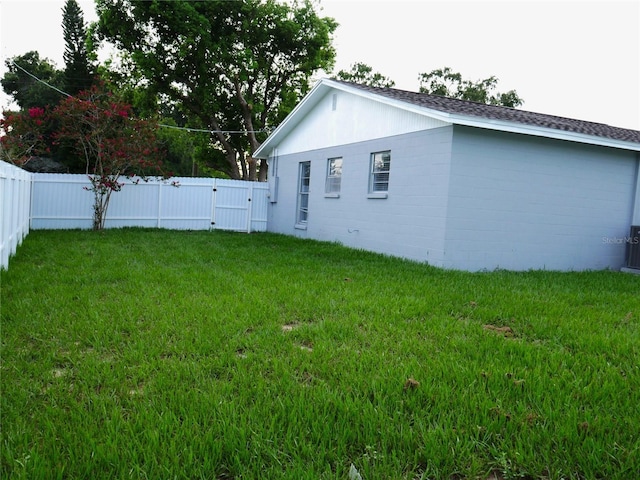 1302 Highview Rd, Brandon, FL 33510 - rear view of property with a fenced backyard and a gate