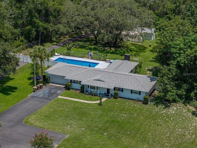 2937 Eagles Nest Rd, Fruitland Park, FL 34731 - view from above of property with a pool area and a heavily wooded area