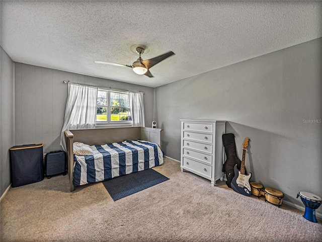 2937 Eagles Nest Rd, Fruitland Park, FL 34731 - carpeted bedroom featuring ceiling fan and a textured ceiling