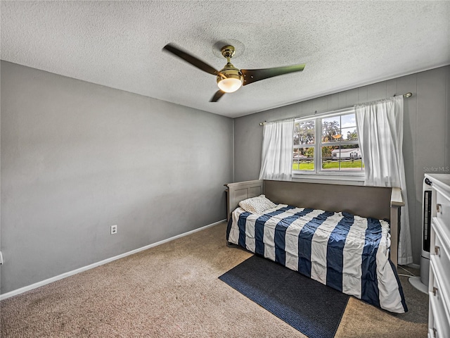 2937 Eagles Nest Rd, Fruitland Park, FL 34731 - bedroom with carpet flooring, ceiling fan, and a textured ceiling