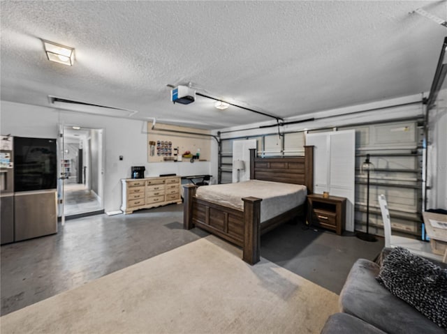 2937 Eagles Nest Rd, Fruitland Park, FL 34731 - bedroom featuring finished concrete flooring, a garage, and a textured ceiling