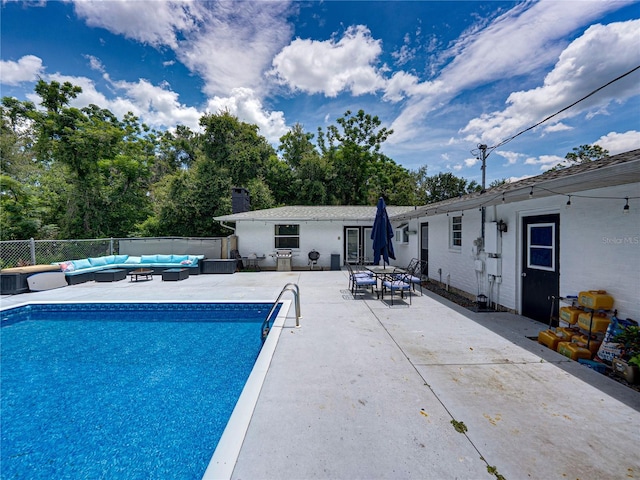 2937 Eagles Nest Rd, Fruitland Park, FL 34731 - view of swimming pool with an outdoor living space and a patio