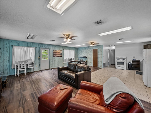 2937 Eagles Nest Rd, Fruitland Park, FL 34731 - living room featuring ceiling fan and wood finished floors