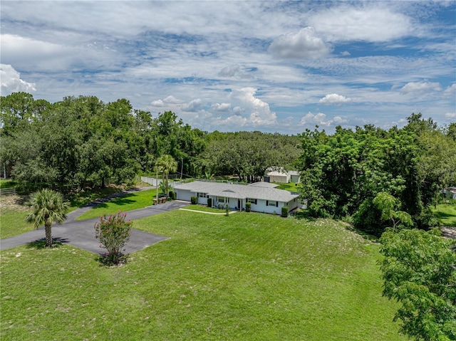 2937 Eagles Nest Rd, Fruitland Park, FL 34731 - view of front facade with asphalt driveway and a front lawn