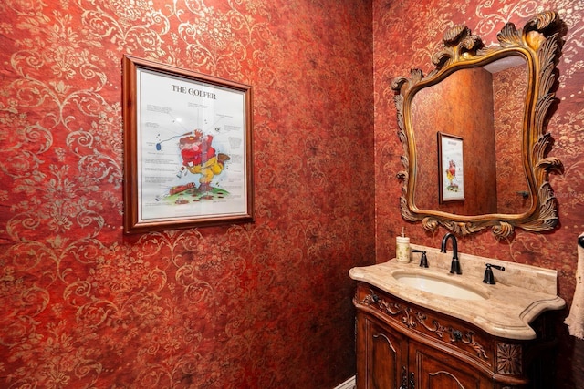 703 Islebay Dr, Apollo Beach, FL 33572 - bathroom featuring wallpapered walls and vanity