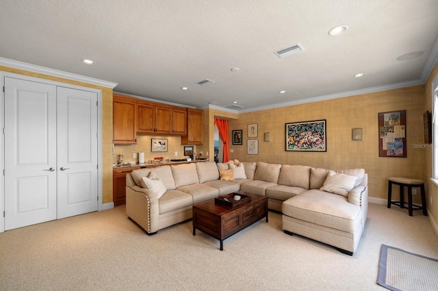 703 Islebay Dr, Apollo Beach, FL 33572 - living area with light carpet, recessed lighting, and ornamental molding