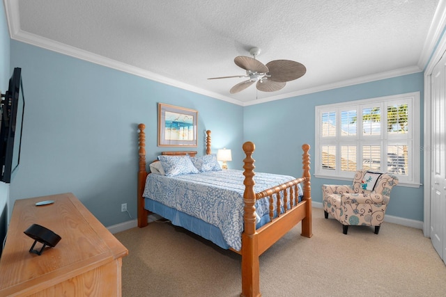 703 Islebay Dr, Apollo Beach, FL 33572 - bedroom with light carpet, crown molding, a textured ceiling, and a ceiling fan