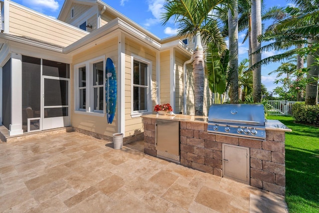 703 Islebay Dr, Apollo Beach, FL 33572 - view of patio / terrace with area for grilling and a sunroom