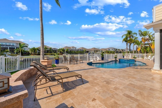 703 Islebay Dr, Apollo Beach, FL 33572 - view of swimming pool featuring a residential view, a pool with connected hot tub, and a patio