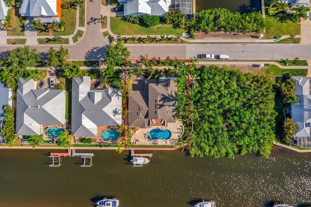 703 Islebay Dr, Apollo Beach, FL 33572 - aerial perspective of suburban area with a pool