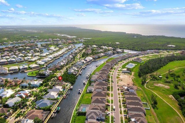 703 Islebay Dr, Apollo Beach, FL 33572 - aerial view of property and surrounding area with nearby suburban area and a nearby body of water