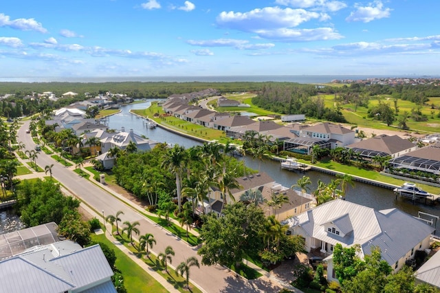 703 Islebay Dr, Apollo Beach, FL 33572 - aerial perspective of suburban area featuring a large body of water