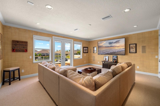 703 Islebay Dr, Apollo Beach, FL 33572 - living area featuring crown molding, a textured ceiling, light colored carpet, recessed lighting, and french doors
