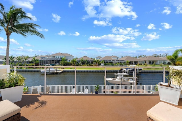 703 Islebay Dr, Apollo Beach, FL 33572 - water view featuring nearby suburban area, a boat dock, and boat lift