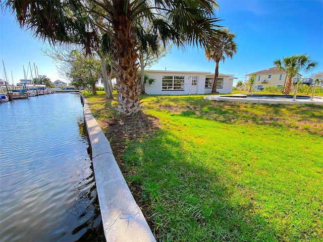 13534 Evelane Dr, Hudson, FL 34667 - dock area featuring a yard and a water view