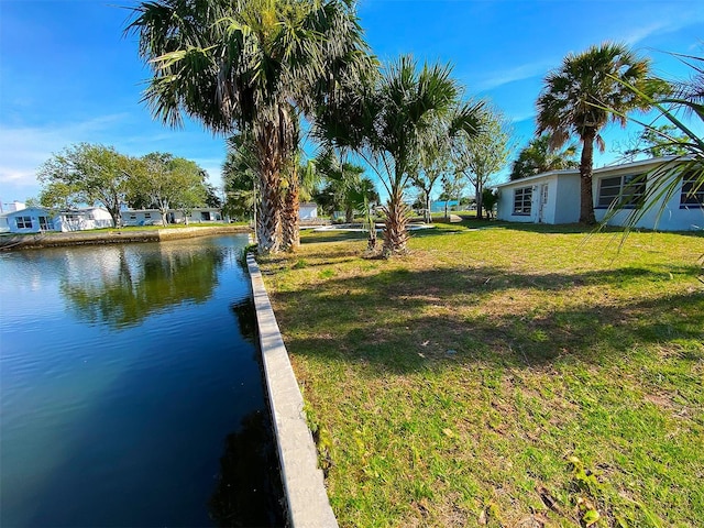 13534 Evelane Dr, Hudson, FL 34667 - view of green lawn with a water view
