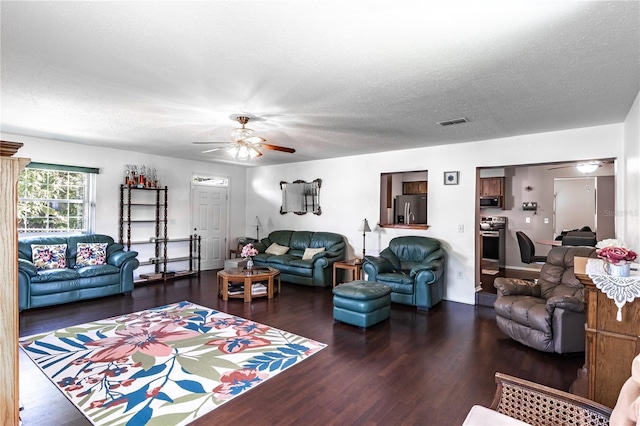 2719 N 91 Mine Rd, Bartow, FL 33830 - living room featuring a ceiling fan, wood finished floors, and a textured ceiling