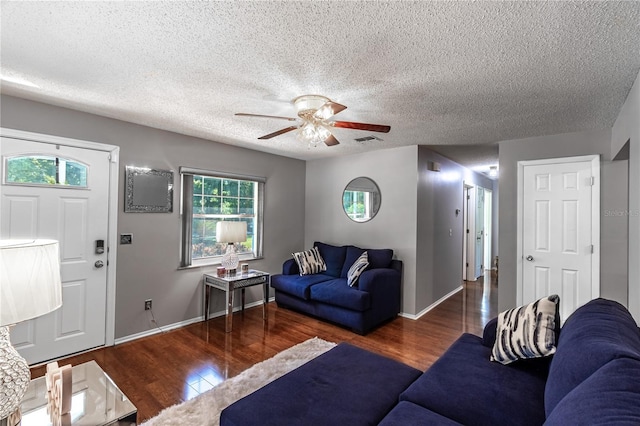 2719 N 91 Mine Rd, Bartow, FL 33830 - living area with a ceiling fan, wood finished floors, and a textured ceiling