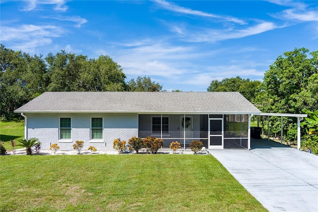 2719 N 91 Mine Rd, Bartow, FL 33830 - ranch-style house featuring an attached carport, a front lawn, driveway, and brick siding