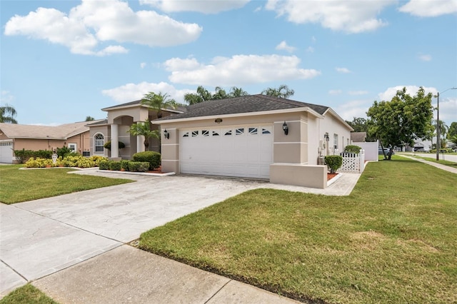 8704 Cypress Lakes Blvd, New Port Richey, FL 34653 - ranch-style house with stucco siding, an attached garage, and driveway