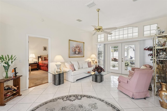 8704 Cypress Lakes Blvd, New Port Richey, FL 34653 - living area with french doors, light tile patterned floors, and ceiling fan