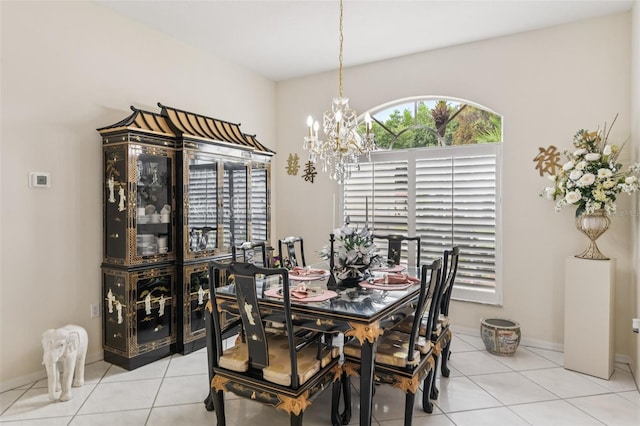 8704 Cypress Lakes Blvd, New Port Richey, FL 34653 - dining space with a chandelier and light tile patterned floors