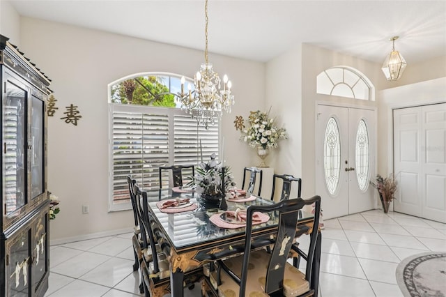 8704 Cypress Lakes Blvd, New Port Richey, FL 34653 - dining room featuring light tile patterned floors and a chandelier