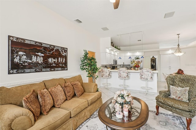 8704 Cypress Lakes Blvd, New Port Richey, FL 34653 - living room featuring light tile patterned flooring