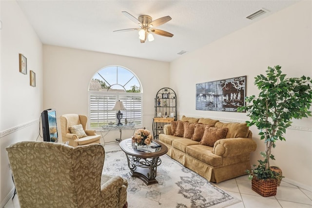 8704 Cypress Lakes Blvd, New Port Richey, FL 34653 - living room featuring a ceiling fan and light tile patterned floors