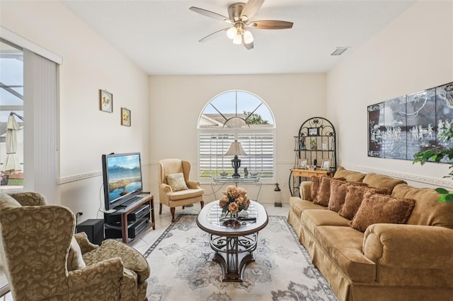8704 Cypress Lakes Blvd, New Port Richey, FL 34653 - living area with ceiling fan and light tile patterned flooring