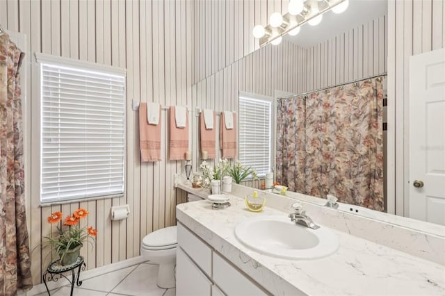 8704 Cypress Lakes Blvd, New Port Richey, FL 34653 - full bathroom with vanity, wallpapered walls, tile patterned floors, and curtained shower