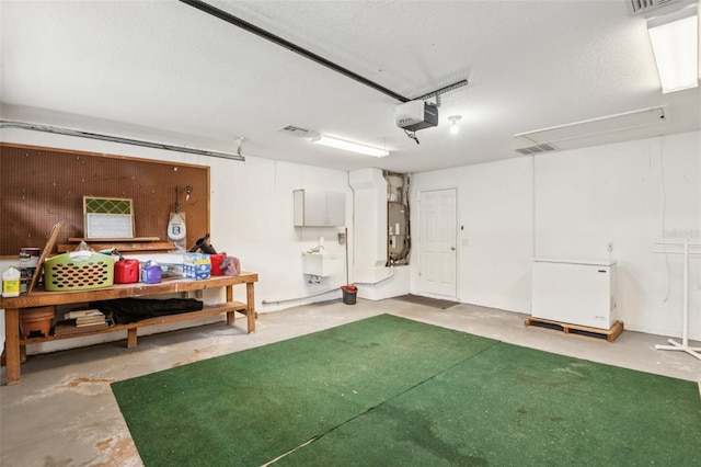 8704 Cypress Lakes Blvd, New Port Richey, FL 34653 - garage with fridge, a workshop area, and a garage door opener