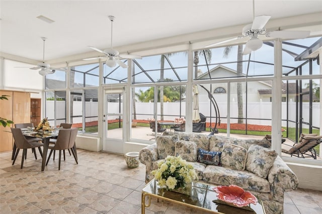 8704 Cypress Lakes Blvd, New Port Richey, FL 34653 - sunroom / solarium with a ceiling fan and outdoor dining space