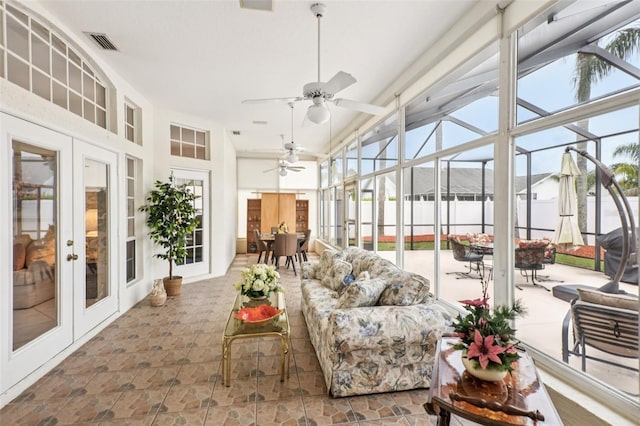 8704 Cypress Lakes Blvd, New Port Richey, FL 34653 - sunroom / solarium with french doors, healthy amount of natural light, and an outdoor living space