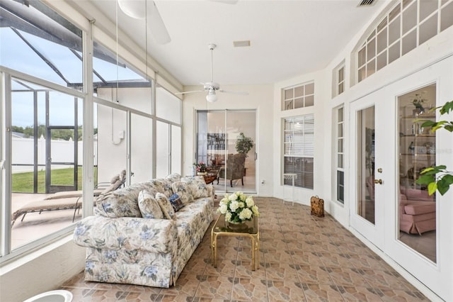 8704 Cypress Lakes Blvd, New Port Richey, FL 34653 - sunroom / solarium featuring ceiling fan and an outdoor living space