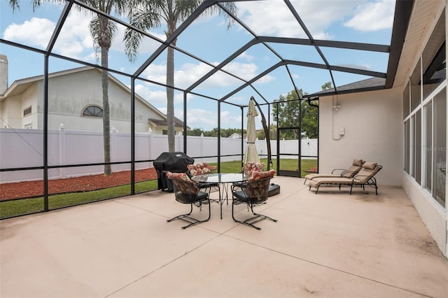 8704 Cypress Lakes Blvd, New Port Richey, FL 34653 - fenced backyard featuring a patio area, a grill, and a lanai
