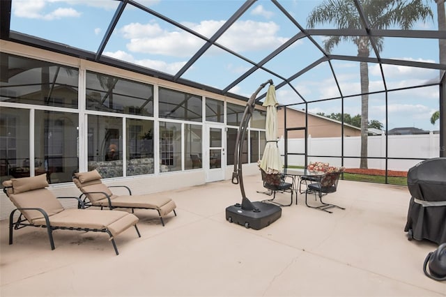 8704 Cypress Lakes Blvd, New Port Richey, FL 34653 - view of patio / terrace featuring a lanai, a grill, and outdoor dining space