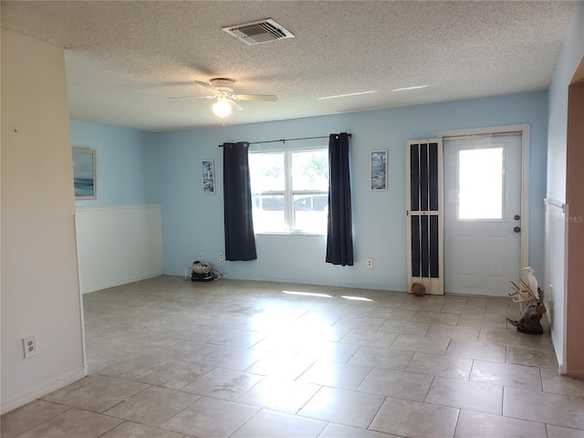 2227 Grenadier Dr Unit 140, Sun City Center, FL 33573 - unfurnished room featuring ceiling fan and a textured ceiling