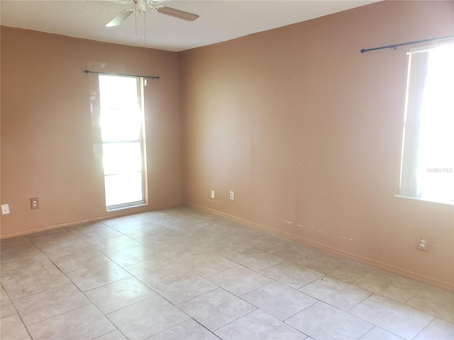 2227 Grenadier Dr Unit 140, Sun City Center, FL 33573 - unfurnished room with a ceiling fan and light tile patterned floors
