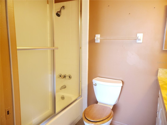 2227 Grenadier Dr Unit 140, Sun City Center, FL 33573 - bathroom featuring vanity and enclosed tub / shower combo