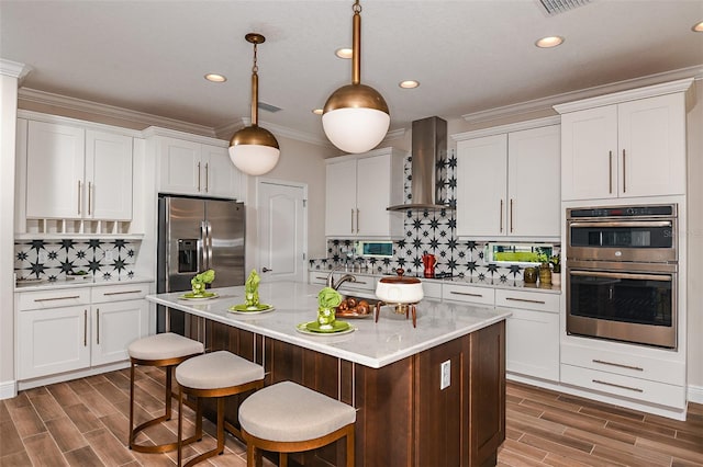 18469 Purple Creek Ln, Lutz, FL 33549 - kitchen featuring stainless steel appliances, wall chimney exhaust hood, tasteful backsplash, white cabinets, and light countertops
