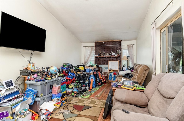 712 Divot Ln, Poinciana, FL 34759 - living room featuring wood finished floors