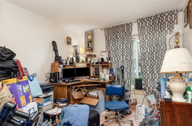 712 Divot Ln, Poinciana, FL 34759 - office area featuring a textured ceiling