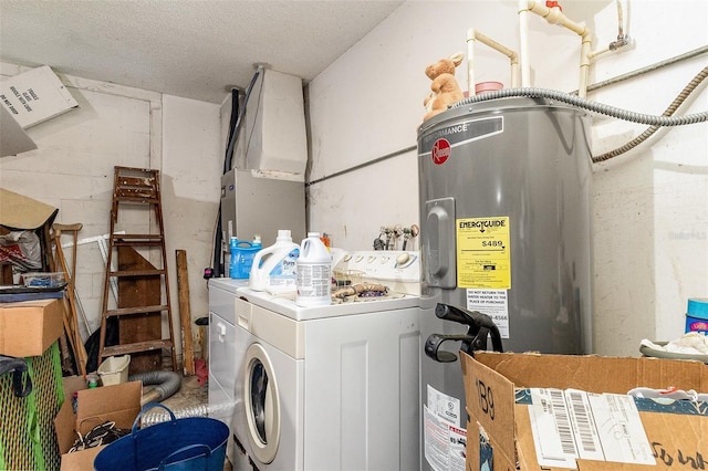 712 Divot Ln, Poinciana, FL 34759 - washroom featuring electric water heater, washer and clothes dryer, and concrete block wall