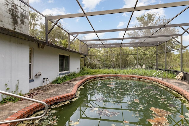 712 Divot Ln, Poinciana, FL 34759 - outdoor pool featuring glass enclosure