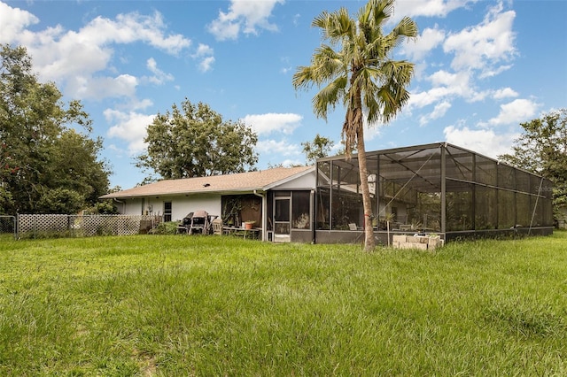712 Divot Ln, Poinciana, FL 34759 - back of property featuring a lanai and stucco siding