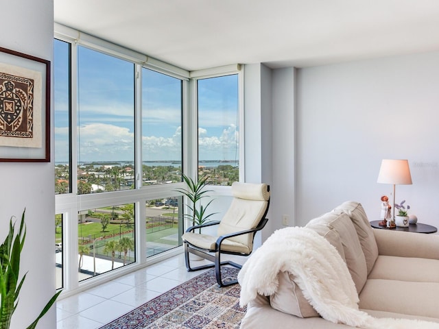 660 Island Way Unit 703, Clearwater Beach, FL 33767 - living room with a wall of windows and tile patterned floors