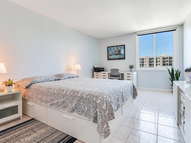 660 Island Way Unit 703, Clearwater Beach, FL 33767 - bedroom with light tile patterned flooring and baseboards